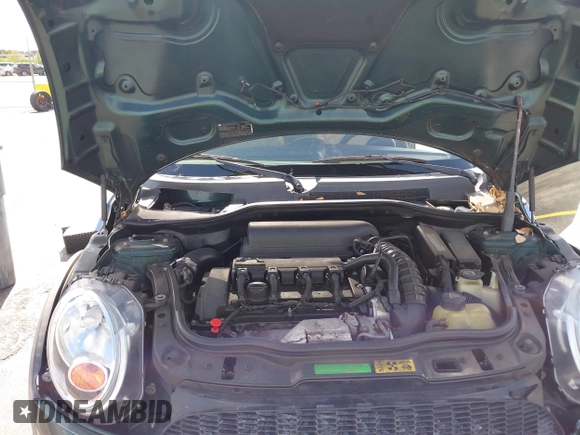 2007 MINI Hardtop S with VIN WMWMF73507TV30183, listed as a IAAI auction lot 42574374 with 90,334 mi miles and . Bid and sale history available at DreamBid. Image 10.