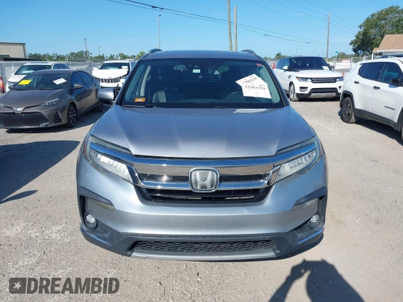 2019 Honda Pilot Elite with VIN 5FNYF6H00KB001016, listed as a IAAI auction lot 42583325 with 133,327 mi miles and . Bid and sale history available at DreamBid. Image 12.
