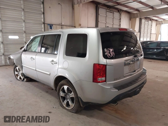 2014 Honda Pilot EX-L with VIN 5FNYF3H56EB024735, listed as a IAAI auction lot 41286284 with 101,221 mi miles. Bid and sale history available at carsss.com. Image 3.