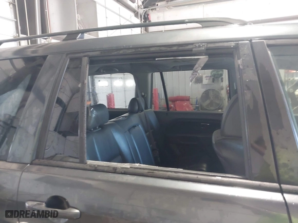 2006 Honda Pilot EX-L with RES with VIN 5FNYF28666B015764, listed as a IAAI auction lot 41703704 with 211,289 mi miles. Bid and sale history available at carsss.com. Image 6.