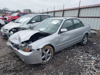 2001 Mazda Protege LX with VIN JM1BJ226910475036, listed as a IAAI auction lot 41428483 with 155,732 mi miles. Bid and sale history available at carsss.com. Image 18.