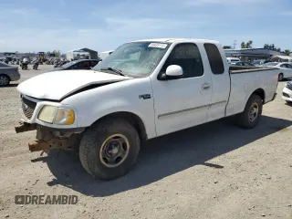 2003 Ford F-150 XL z VIN 2FTRX17213CA05950, wystawiony jako Copart lot #54435115 z przebiegiem 310 503 mil mil oraz Szkoda całkowita • Salvage title. Historia ofert i sprzedaży dostępna na DreamBid. Obrazek 1.