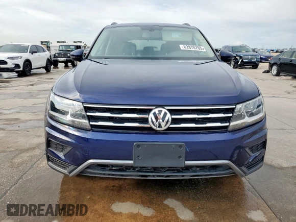 2021 Volkswagen Tiguan SE with VIN 3VV2B7AX6MM051899, listed as a Copart auction lot 62870765 with 56,848 mi miles and Clean title. Bid and sale history available at DreamBid. Image 5.