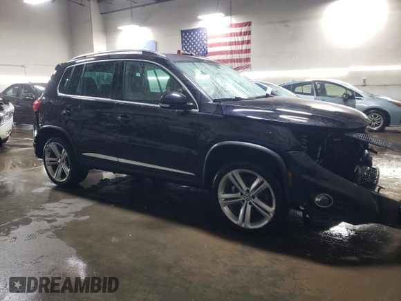2016 Volkswagen Tiguan R-Line with VIN WVGBV7AX8GW609256, listed as a Copart auction lot 85888204 with 93,165 mi miles and Salvage Title. Bid and sale history available at DreamBid. Image 4.