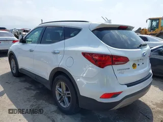 2018 Hyundai Santa Fe 2.4L z VIN 5NMZUDLB3JH055771, wystawiony jako IAAI lot #42126058 z przebiegiem 142 991 mil mil oraz . Historia ofert i sprzedaży dostępna na DreamBid. Obrazek 3.