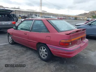 1994 Ford Escort z VIN 1FARP11J8RW128776, wystawiony jako IAAI lot #41502714 z przebiegiem 61 582 mil mil oraz . Historia ofert i sprzedaży dostępna na DreamBid. Obrazek 3.
