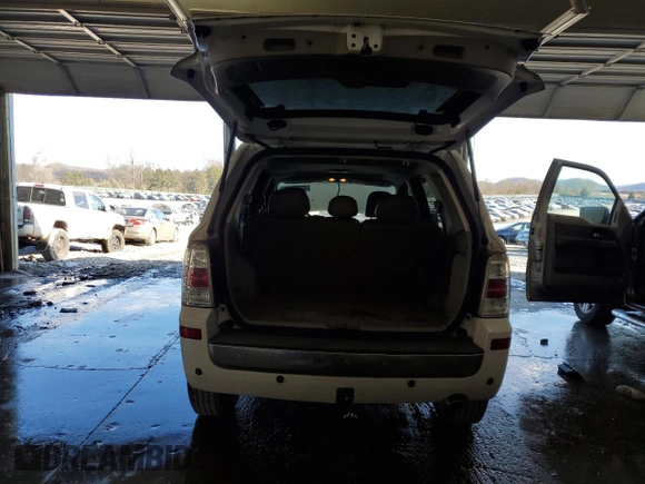 2008 Mercury Mariner Premier z VIN 4M2CU87118KJ28336, wystawiony jako Copart lot #45735155 z przebiegiem 247 541 mil mil oraz Szkoda całkowita • Salvage title. Historia ofert i sprzedaży dostępna na DreamBid. Obrazek 6.