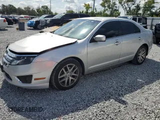 2012 Ford Fusion SEL with VIN 3FAHP0JA3CR303094, listed as a Copart auction lot 65603905 with 176,858 mi miles and Salvage title. Bid and sale history available at DreamBid. Image 1.