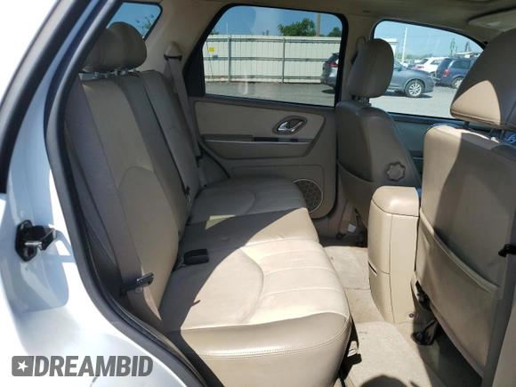 2007 Mercury Mariner Premier with VIN 4M2CU97107KJ12925, listed as a Copart auction lot 62371895 with 141,576 mi miles and Salvage title. Bid and sale history available at DreamBid. Image 11.