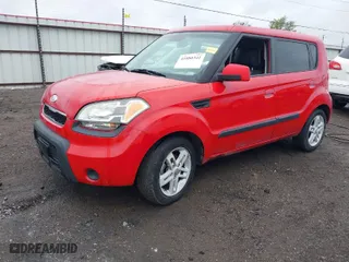 2010 Kia Soul + with VIN KNDJT2A29A7102901, listed as a IAAI auction lot 41880341 with 242,352 mi miles. Bid and sale history available at carsss.com. Image 2.