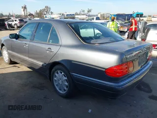 1997 Mercedes-Benz E 320 with VIN WDBJF55F7VA402305, listed as a IAAI auction lot 41865470 with 210,577 mi miles and . Bid and sale history available at DreamBid. Image 3.
