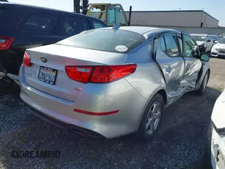2015 Kia Optima LX z VIN 5XXGM4A71FG466873, wystawiony jako IAAI lot #41851355 z przebiegiem 13 880 mil mil oraz . Historia ofert i sprzedaży dostępna na DreamBid. Obrazek 4.