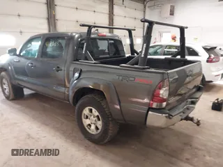 2014 Toyota Tacoma with VIN 3TMLU4EN3EM151917, listed as a IAAI auction lot 41769083 with 216,910 mi miles. Bid and sale history available at carsss.com. Image 3.