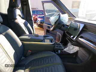2022 Rivian R1T Adventure Package with VIN 7FCTGAAA2NN006098, listed as a IAAI auction lot 41172815 with 1 mi miles. Bid and sale history available at carsss.com. Image 5.