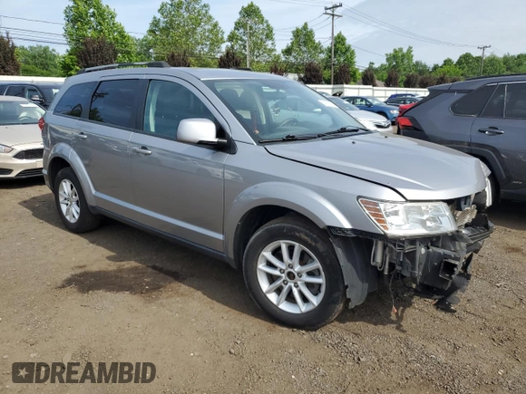 2017 Dodge Journey SXT with VIN 3C4PDDBG4HT608395, listed as a Copart auction lot 60811885 with 145,503 mi miles and Salvage title. Bid and sale history available at DreamBid. Image 4.