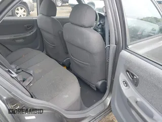 2002 Hyundai Accent GL z VIN KMHCG45C52U372587, wystawiony jako IAAI lot #42244428 z przebiegiem 43 538 mil mil oraz . Historia ofert i sprzedaży dostępna na DreamBid. Obrazek 8.