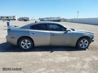 2014 Dodge Charger SE with VIN 2C3CDXBG1EH168709, listed as a IAAI auction lot 41872541 with 137,877 mi miles. Bid and sale history available at carsss.com. Image 14.