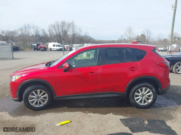 2016 Mazda CX-5 Touring with VIN JM3KE4CY9G0686494, listed as a IAAI auction lot 41822560 with 32,156 mi miles. Bid and sale history available at carsss.com. Image 14.