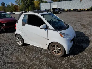 2015 Smart fortwo Passion с VIN WMEEK3BA5FK835565, выставлен на аукционе Copart как лот 76688204 с пробегом 62 674 миль миль и Списание • Salvage title. История ставок и продаж доступна на DreamBid. Изображение 4.