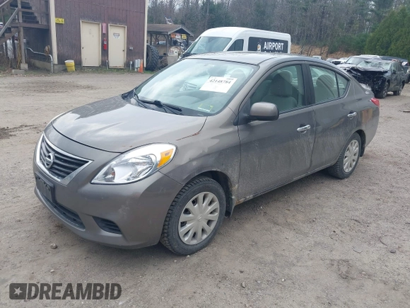 2012 Nissan Versa SV with VIN 3N1CN7AP2CL860205, listed as a IAAI auction lot 42148784 with 185,019 mi miles. Bid and sale history available at carsss.com. Image 2.
