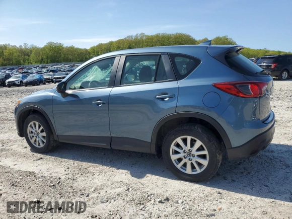 2016 Mazda CX-5 Sport with VIN JM3KE4BY8G0745522, listed as a Copart auction lot 56621825 with 98,757 mi miles and Salvage title. Bid and sale history available at DreamBid. Image 2.