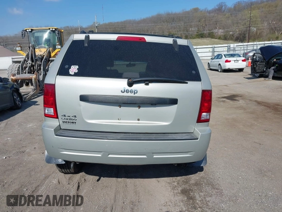 2008 Jeep Grand Cherokee Laredo with VIN 1J8GR48K28C169859, listed as a IAAI auction lot 41965149 with 166,069 mi miles. Bid and sale history available at carsss.com. Image 16.