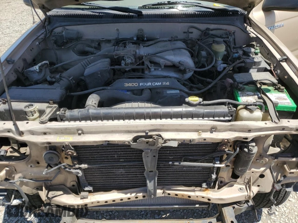 1999 Toyota Tacoma PreRunner with VIN 4TASN92N7XZ573079, listed as a Copart auction lot 56917035 with 254,939 mi miles and Salvage title. Bid and sale history available at DreamBid. Image 11.