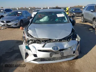 2017 Toyota Prius Two with VIN JTDKBRFU3H3034087, listed as a IAAI auction lot 40982253 with 158,745 mi miles and . Bid and sale history available at DreamBid. Image 12.