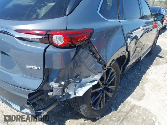2021 Mazda CX-9 Carbon Edition with VIN JM3TCADY9M0517174, listed as a IAAI auction lot 41871485 with 48,484 mi miles and . Bid and sale history available at DreamBid. Image 6.