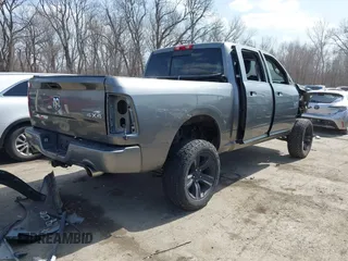 2013 Ram 1500 Sport z VIN 1C6RR7MT4DS545114, wystawiony jako IAAI lot #41797216 z przebiegiem 154 564 mil mil oraz . Historia ofert i sprzedaży dostępna na DreamBid. Obrazek 4.