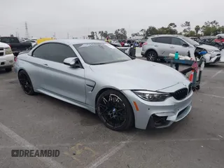 2018 BMW M4 z VIN WBS4Z9C50JED22690, wystawiony jako IAAI lot #42439194 z przebiegiem 61 928 mil mil oraz . Historia ofert i sprzedaży dostępna na DreamBid. Obrazek 1.