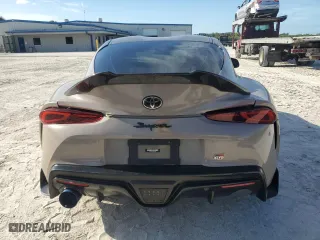 2022 Toyota GR Supra 3.0 with VIN WZ1DB0C0XNW051907, listed as a Copart auction lot 70628834 with 23,012 mi miles and Salvage Title. Bid and sale history available at carsss.com. Image 6.