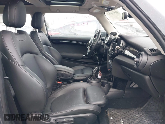 2020 MINI Hardtop Cooper S z VIN WMWXR5C07L2L60692, wystawiony jako IAAI lot #41621462 z przebiegiem 66 898 mil mil oraz . Historia ofert i sprzedaży dostępna na DreamBid. Obrazek 5.