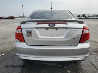 2012 Ford Fusion SE z VIN 3FAHP0HA1CR218938, wystawiony jako Copart lot #59588135 z przebiegiem 111 243 mil mil oraz Szkoda całkowita • Salvage title. Historia ofert i sprzedaży dostępna na DreamBid. Obrazek 6.