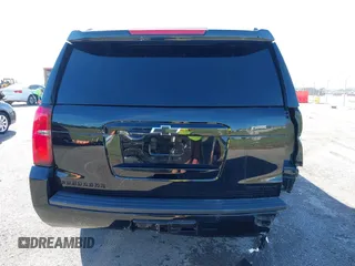 2019 Chevrolet Suburban Premier with VIN 1GNSKJKJ1KR100936, listed as a IAAI auction lot 40489121 with 97,884 mi miles and . Bid and sale history available at DreamBid. Image 17.