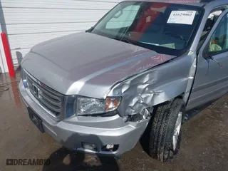 2014 Honda Ridgeline RTL with VIN 5FPYK1F51EB012843, listed as a IAAI auction lot 41629002 with 114,761 mi miles. Bid and sale history available at carsss.com. Image 6.