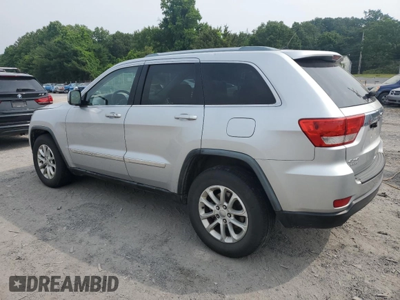 2011 Jeep Grand Cherokee Laredo with VIN 1J4RR4GG3BC581321, listed as a Copart auction lot 60893935 with 216,137 mi miles and Clean title. Bid and sale history available at DreamBid. Image 2.