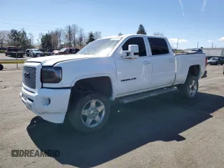 2015 GMC Sierra 2500HD Denali z VIN 1GT120E8XFF560059, wystawiony jako Copart lot #60070245 z przebiegiem Nie podano mil oraz Szkoda całkowita • Salvage title. Historia ofert i sprzedaży dostępna na DreamBid. Obrazek 1.