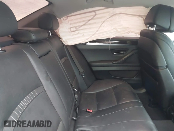 2014 BMW 5 Series 535d with VIN WBAXA5C58ED689864, listed as a IAAI auction lot 40983130 with 139,104 mi miles and . Bid and sale history available at carsss.com. Image 8.