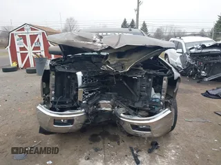 2015 Chevrolet Silverado 1500 LT with VIN 1GCVKREC9FZ237338, listed as a IAAI auction lot 41897225 with 154,229 mi miles and . Bid and sale history available at DreamBid. Image 12.