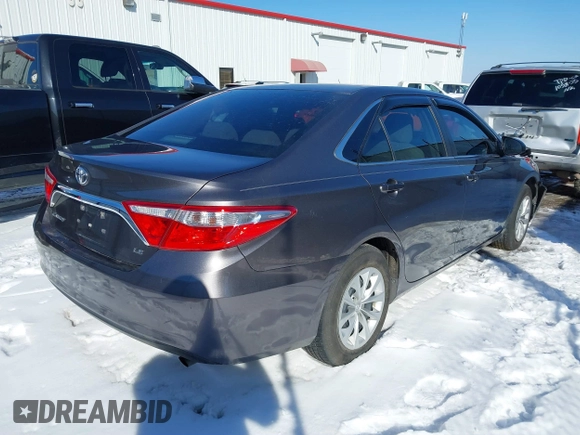 2015 Toyota Camry XLE with VIN 4T4BF1FK6FR465360, listed as a IAAI auction lot 41615471 with 166,584 mi miles. Bid and sale history available at carsss.com. Image 4.