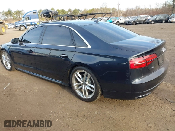 2017 Audi A8 L with VIN WAU44AFDXHN006857, listed as a IAAI auction lot 41758062 with 88,385 mi miles. Bid and sale history available at carsss.com. Image 3.