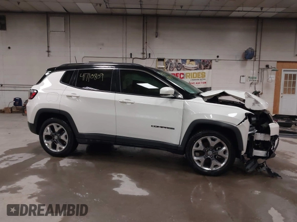 2021 Jeep Compass Limited with VIN 3C4NJCCB0MT576990, listed as a IAAI auction lot 41710809 with 77,903 mi miles. Bid and sale history available at carsss.com. Image 13.