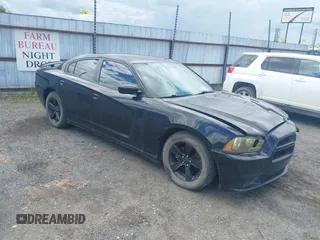 2013 Dodge Charger SE z VIN 2C3CDXBG9DH623059, wystawiony jako IAAI lot #42216088 z przebiegiem 199 241 mil mil oraz . Historia ofert i sprzedaży dostępna na DreamBid. Obrazek 1.