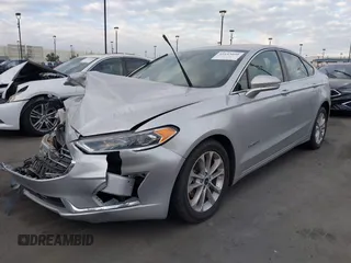 2019 Ford Fusion Hybrid SEL with VIN 3FA6P0MU3KR262056, listed as a IAAI auction lot 41643020 with 1 mi miles. Bid and sale history available at carsss.com. Image 2.