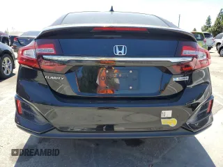 2020 Honda Clarity Plug-In Hybrid with VIN JHMZC5F13LC002225, listed as a Copart auction lot 68190924 with 77,871 mi miles and Salvage Title. Bid and sale history available at carsss.com. Image 6.