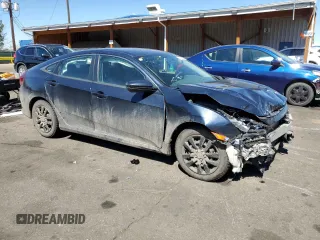 2018 Honda Civic Sedan LX with VIN 19XFC2F55JE014954, listed as a Copart auction lot 50823025 with 0 mi miles and Salvage Title. Bid and sale history available at carsss.com. Image 4.