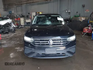 2022 Volkswagen Tiguan SE z VIN 3VV2B7AX6NM073743, wystawiony jako IAAI lot #39948815 z przebiegiem 56 368 mil mil oraz . Historia ofert i sprzedaży dostępna na DreamBid. Obrazek 12.