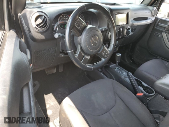 2015 Jeep Wrangler Freedom Edition with VIN 1C4AJWAG8FL688255, listed as a Copart auction lot 59722165 with 130,666 mi miles and Salvage title. Bid and sale history available at DreamBid. Image 8.