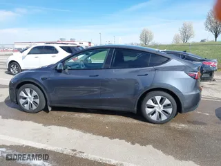 2023 Tesla Model Y Long Range with VIN 7SAYGDEE3PA204992, listed as a IAAI auction lot 41849104 with 22,490 mi miles. Bid and sale history available at carsss.com. Image 14.